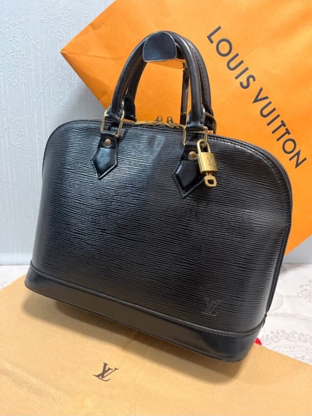 Louis Vuitton Alma Handbag